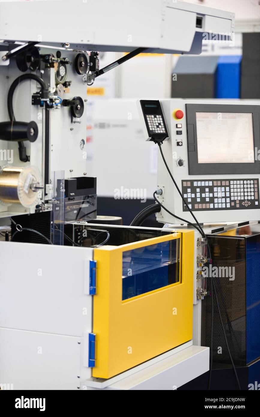 Automated metal cutting machine. Stock Photo
