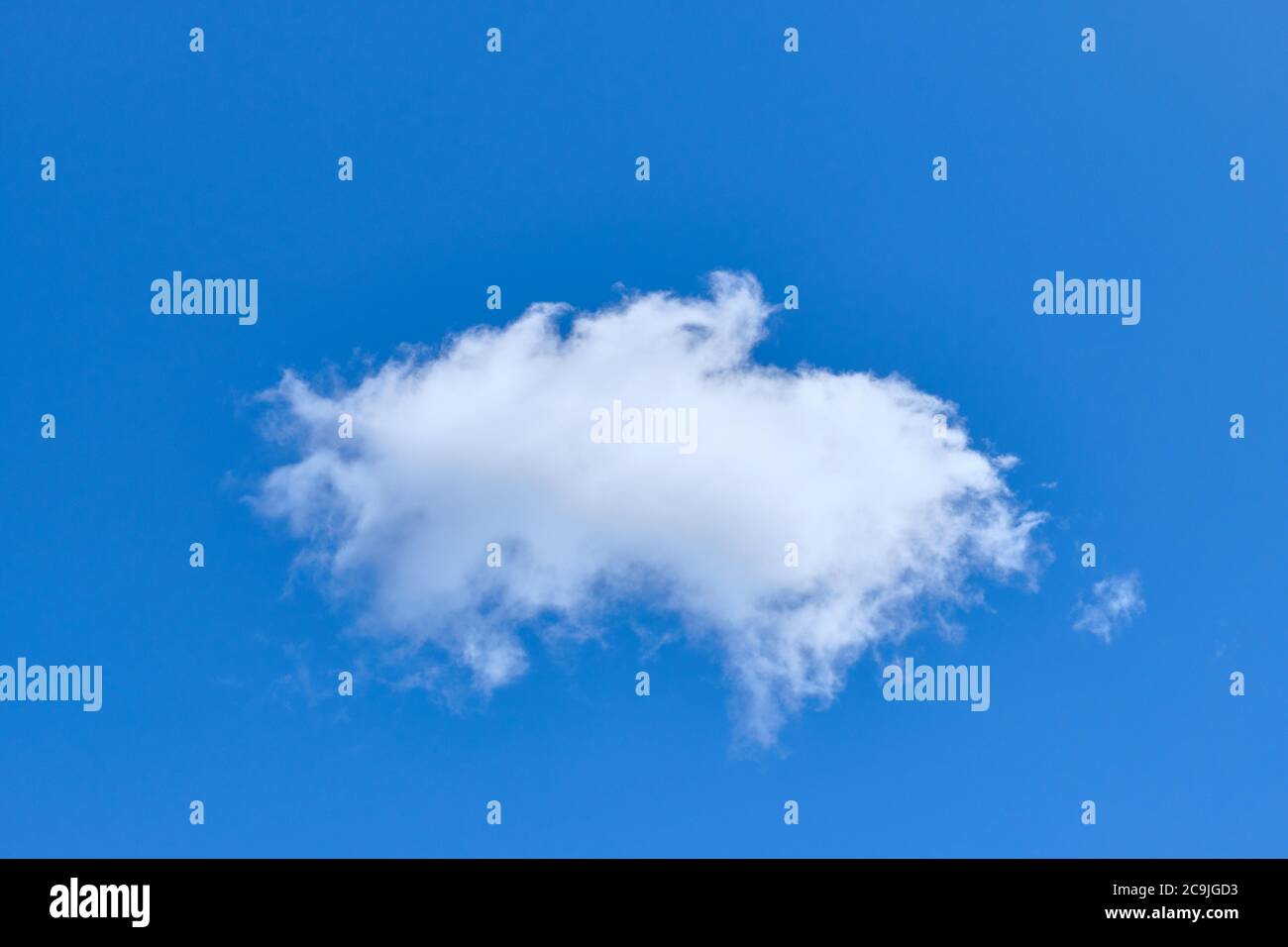 White solitary cloud in blue cloud close up Stock Photo