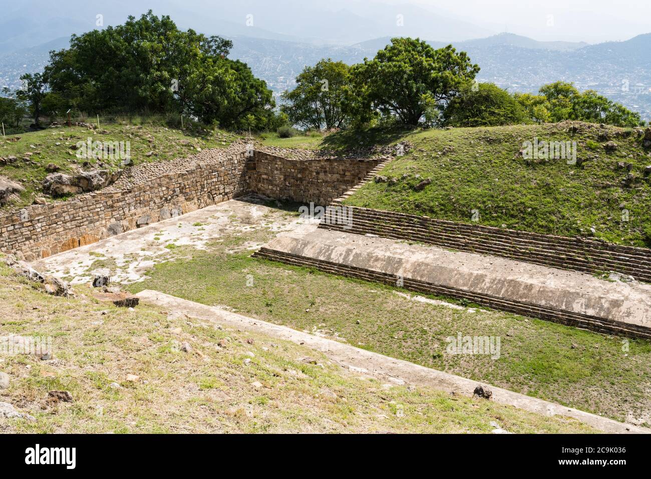 The largest ball court in the ruins of the Zapotec city of Atzompa, near Oaxaca, Mexico.  It is the largest ball court in the Monte Alban group. Stock Photo