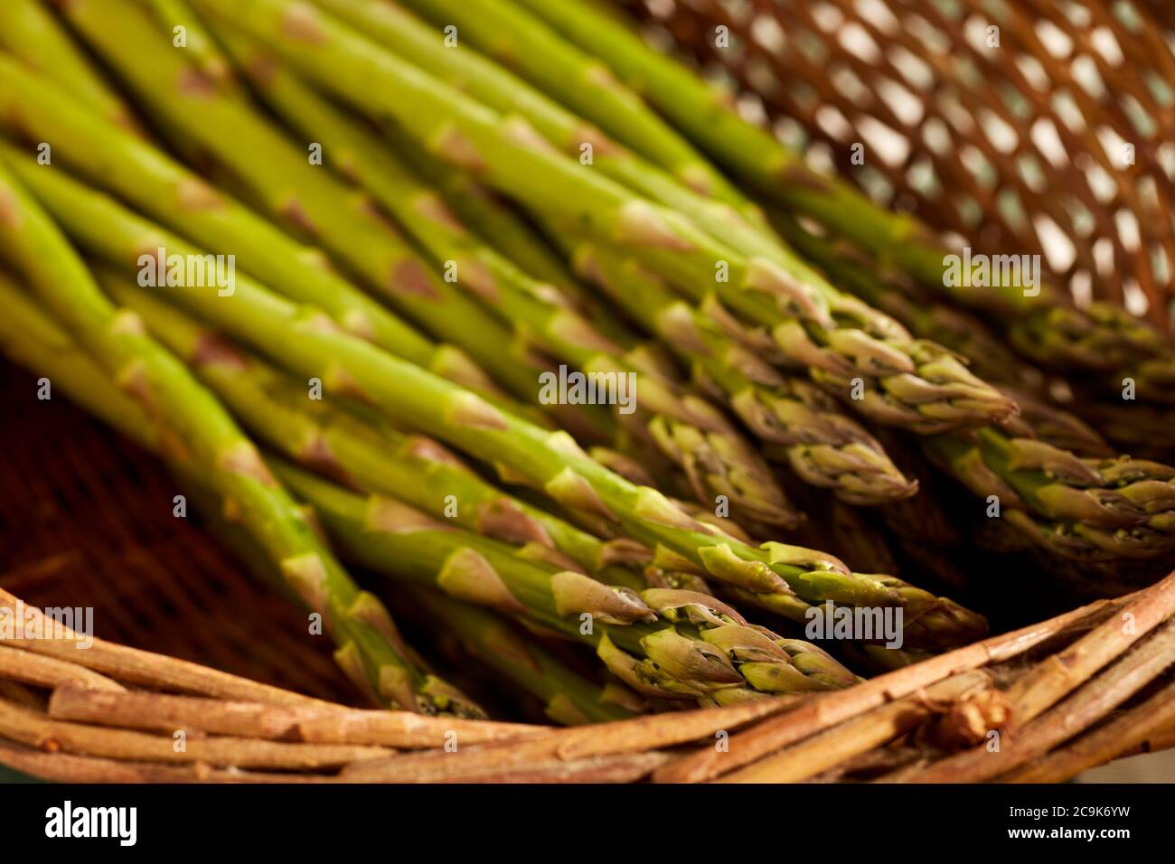 A basket of fresh, raw asparagus spears from Lancaster, Pennsylvania, USA Stock Photo