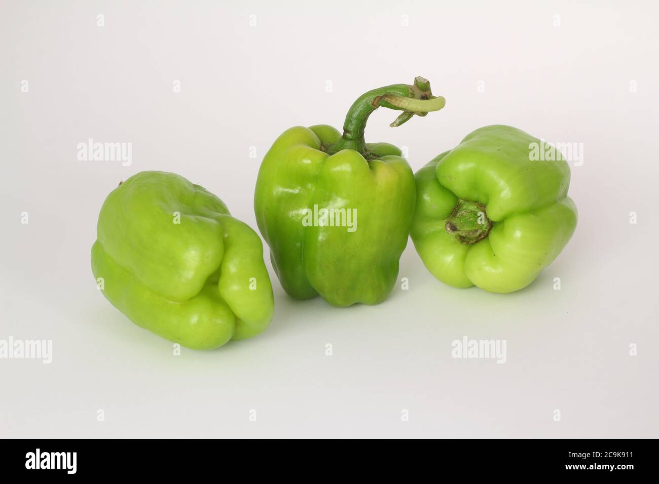 Sweet green bell pepper on white isolated background with clipping path