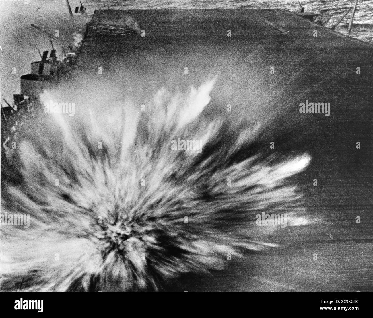 Japanese bomb hits USS Enterprise (CV-6) flight deck during Battle of the Eastern Solomons on 24 August 1942 Stock Photo