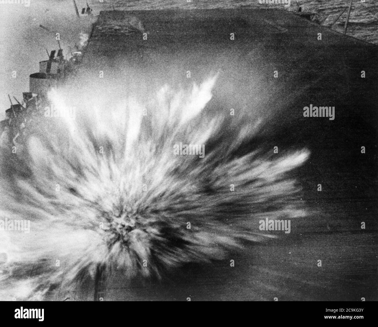 Japanese bomb hits USS Enterprise (CV-6) flight deck during Battle of the Eastern Solomons, 24 August 1942 Stock Photo