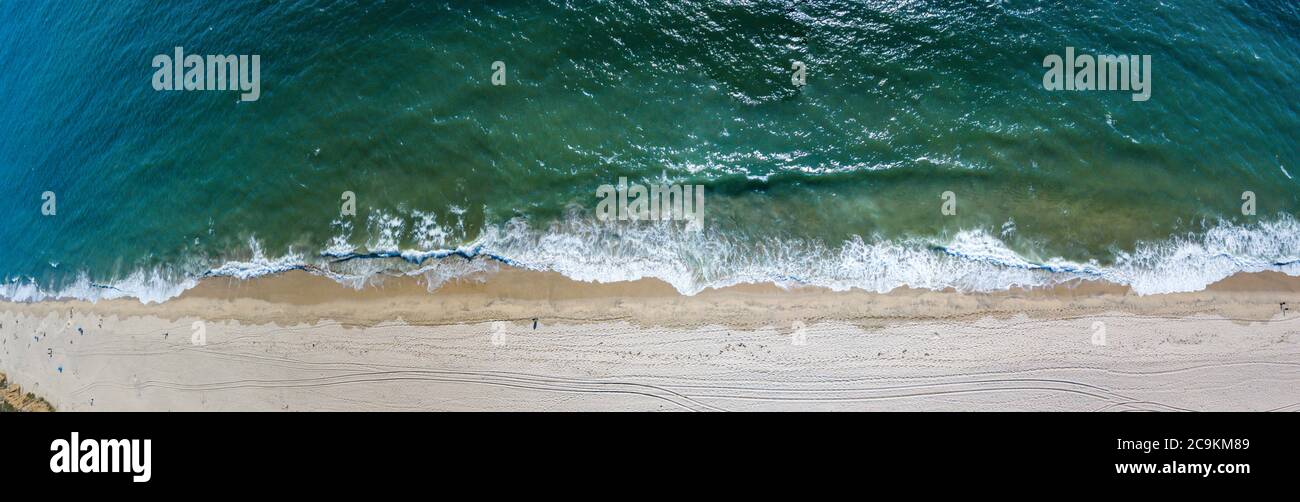 Aerial view to tropical sandy beach and turquoise ocean Stock Photo
