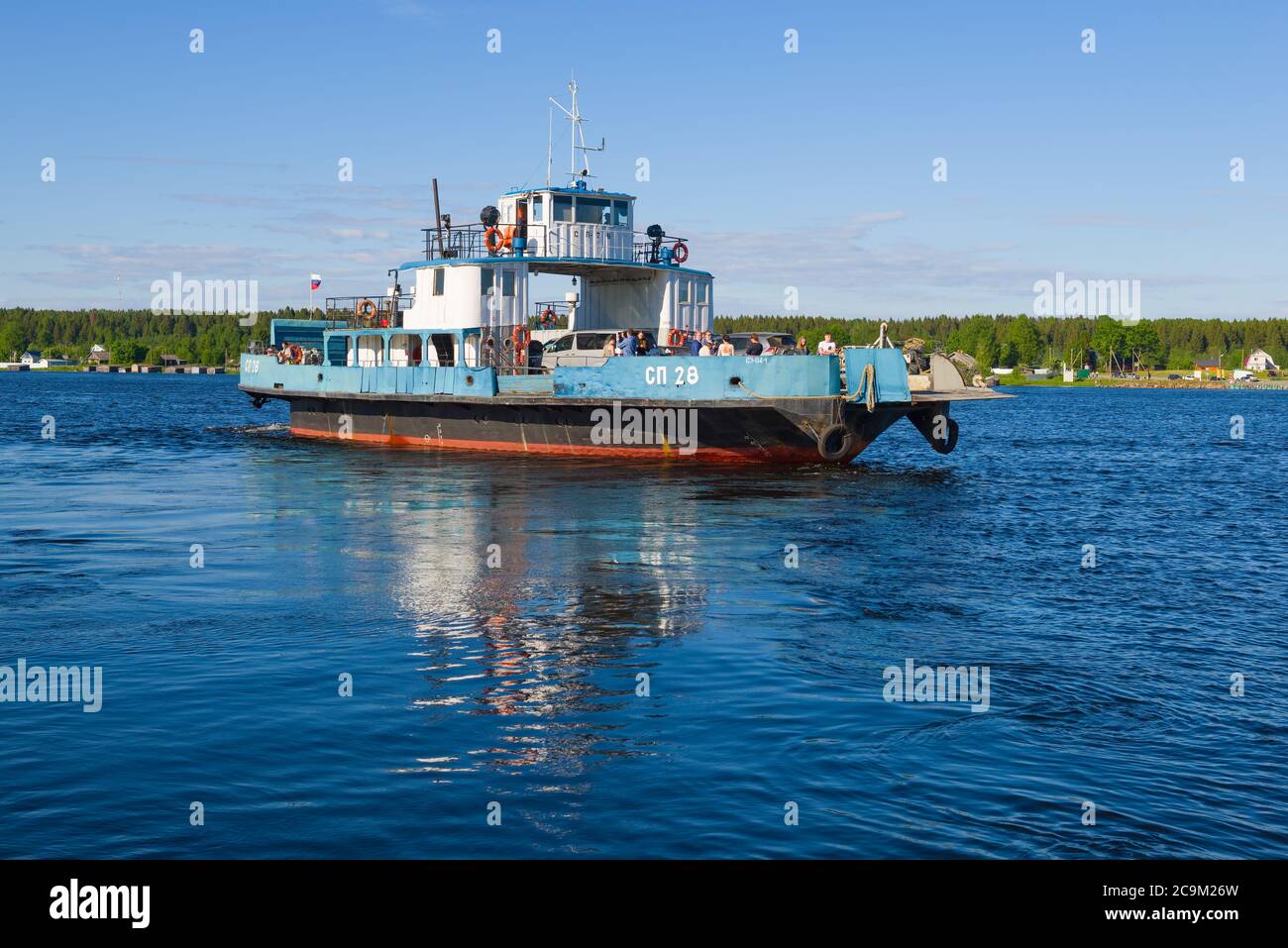 VOZNESENYE, RUSSIA - JUNE 13, 2020: Car ferry SP-28 on the Svir River on a sunny June day Stock Photo