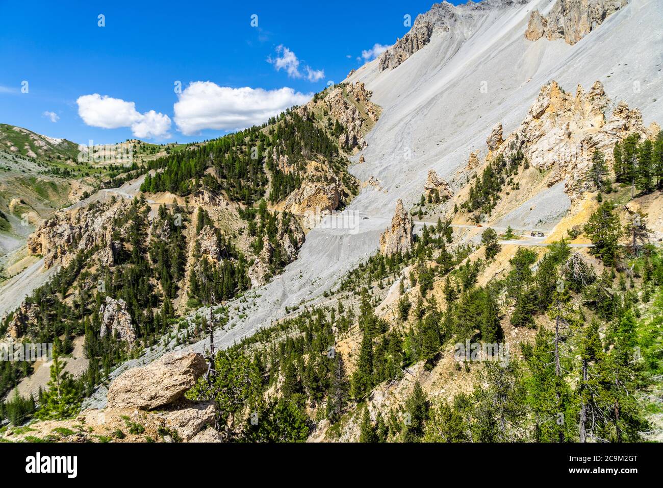 The scenic landscape of the Casse Deserte en route to the Col d'Izoard, one of the most iconic mountain pass of the Tour de France Stock Photo
