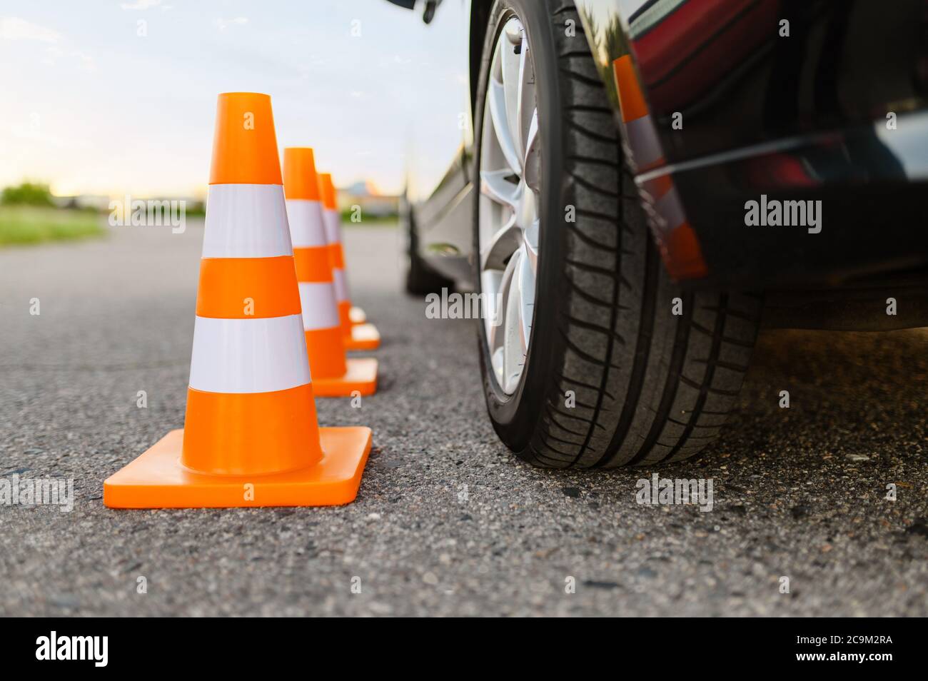 Car and traffic cones, driving school concept Stock Photo Alamy