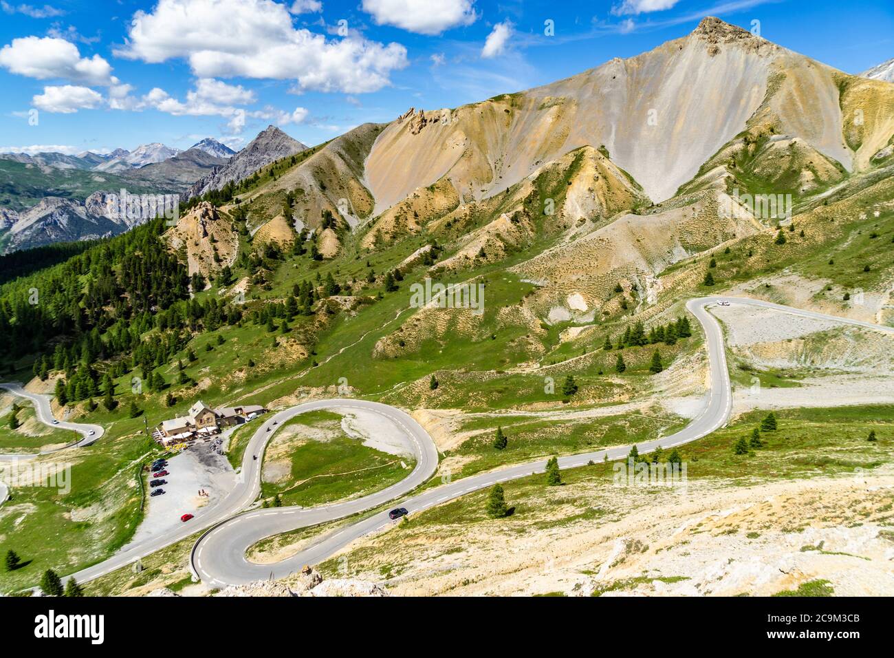The scenic serpentine road climbing up to the Col d'Izoard (2360), one ...