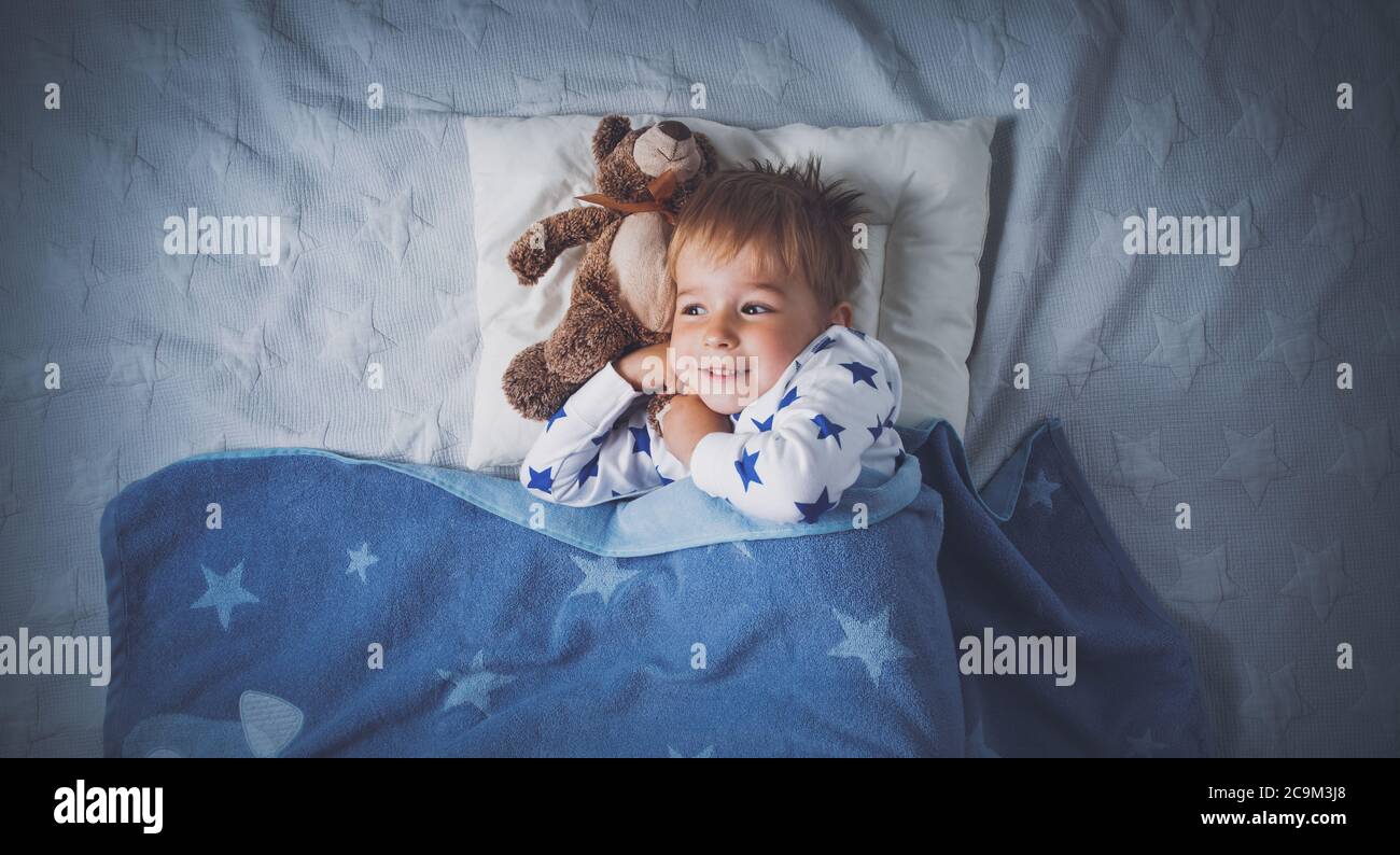 three years old child sleeping in bed Stock Photo Alamy