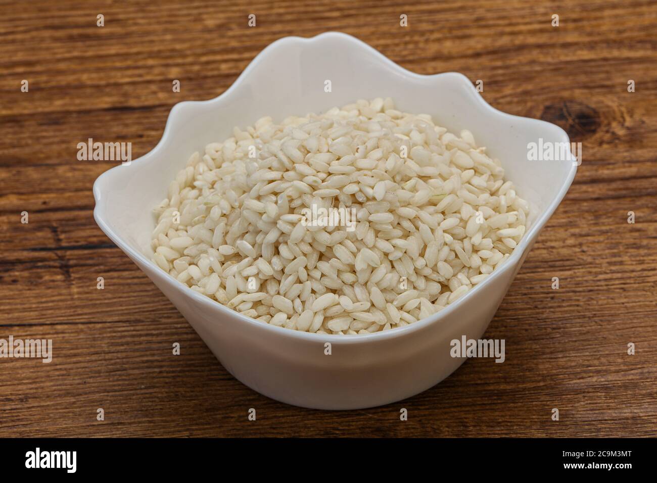 Raw Italian arborio rice for Risotto Stock Photo - Alamy