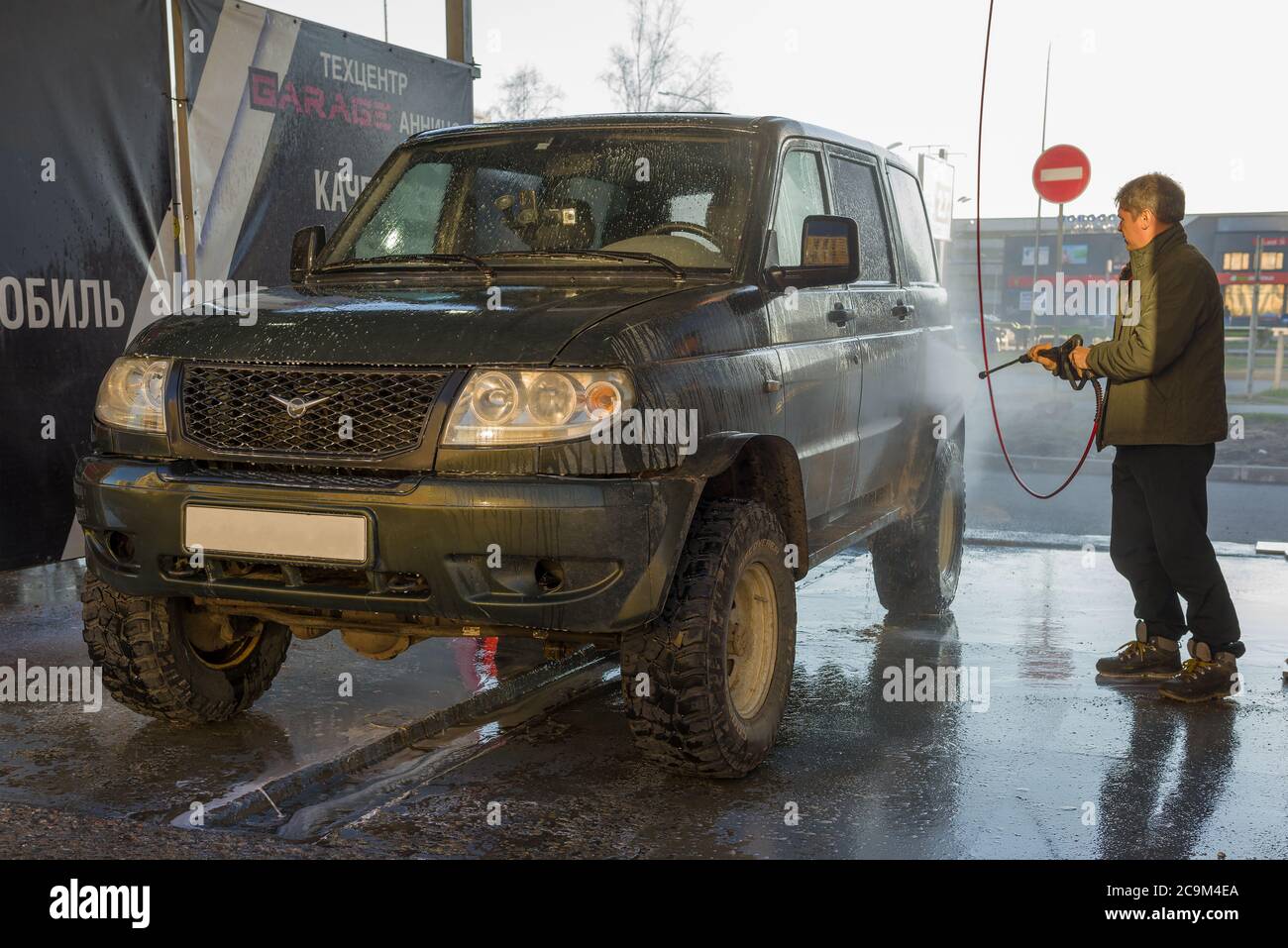 ST. PETERSBURG, RUSSIA - MAY 03, 2020: Russian UAZ-PATRIOT car at a self-service car wash Stock Photo