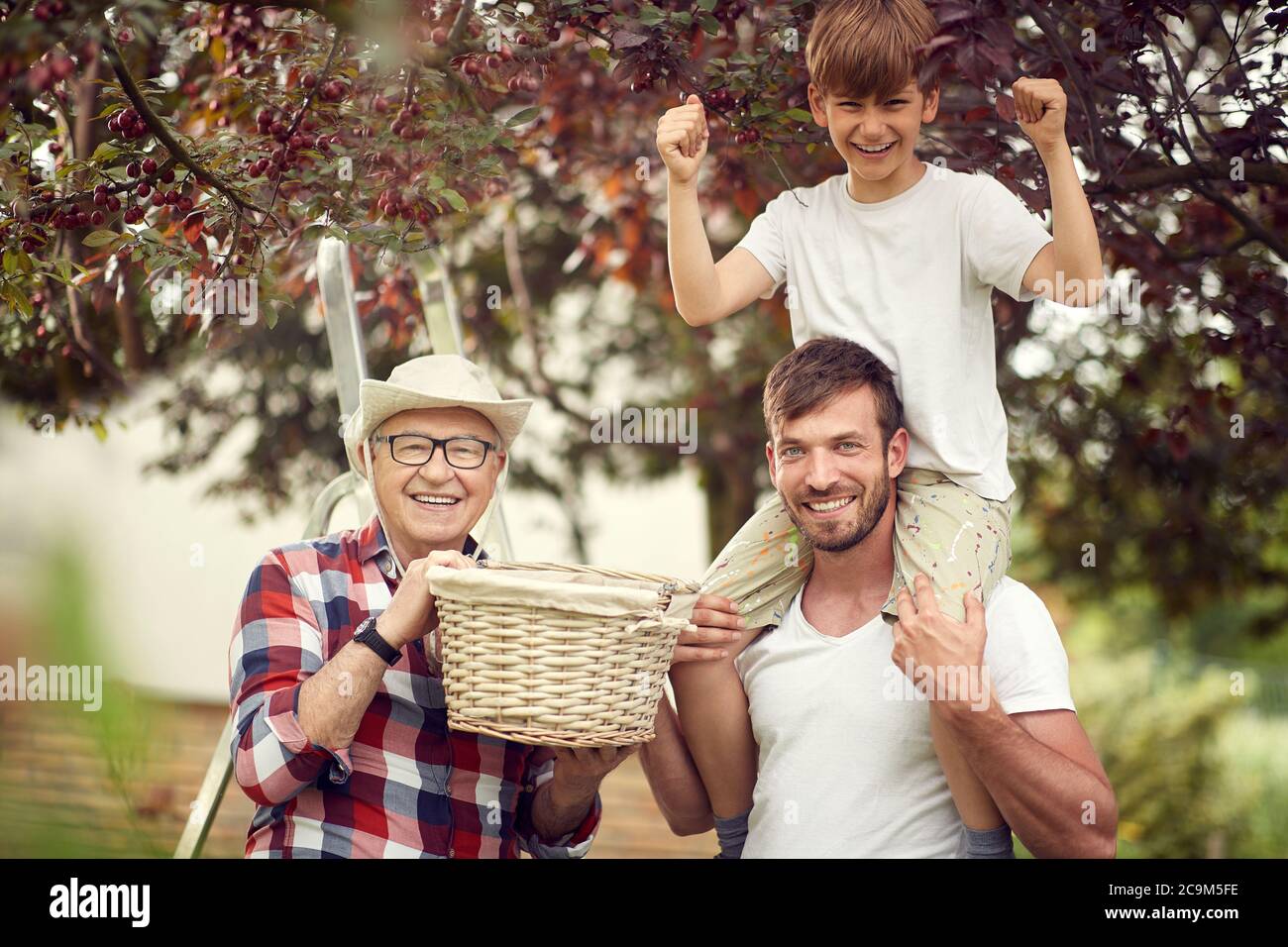 Happy family garden hi-res stock photography and images - Alamy