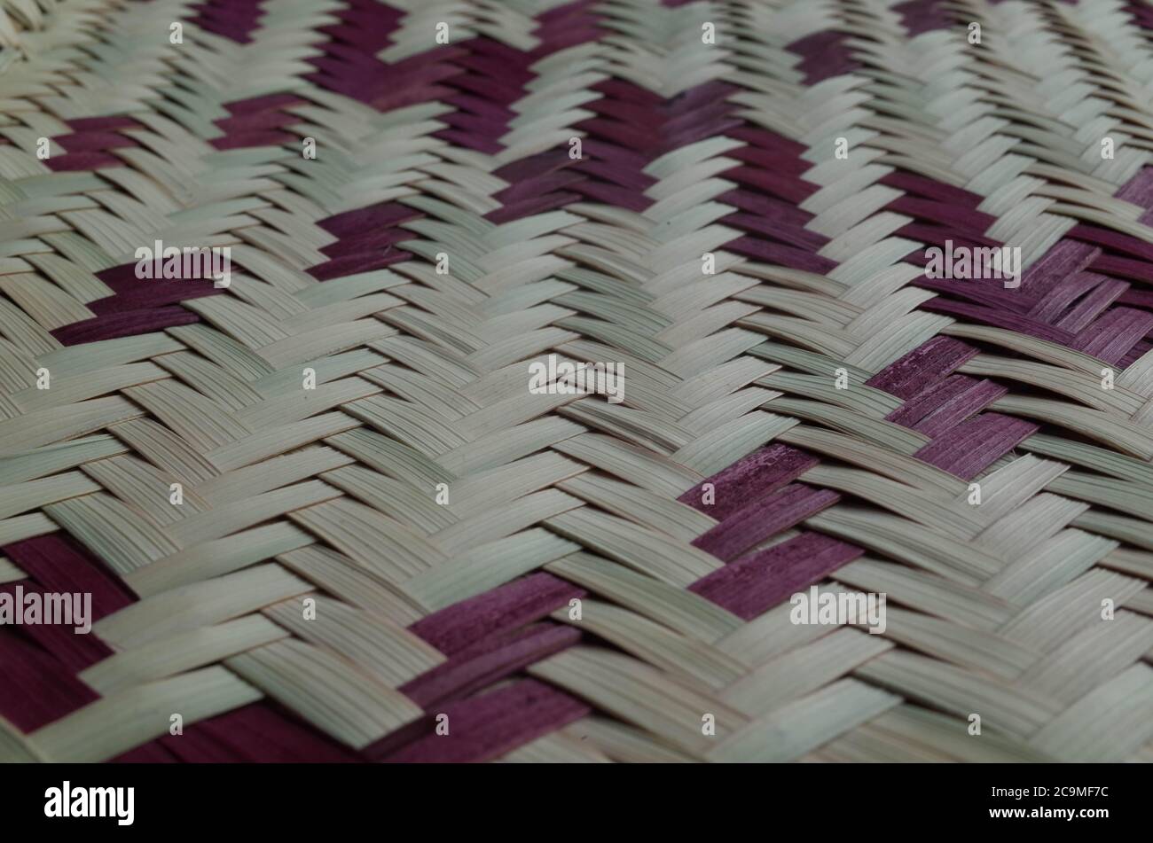 Close-up of a Woven Herringbone Patterned Mat. Stock Photo