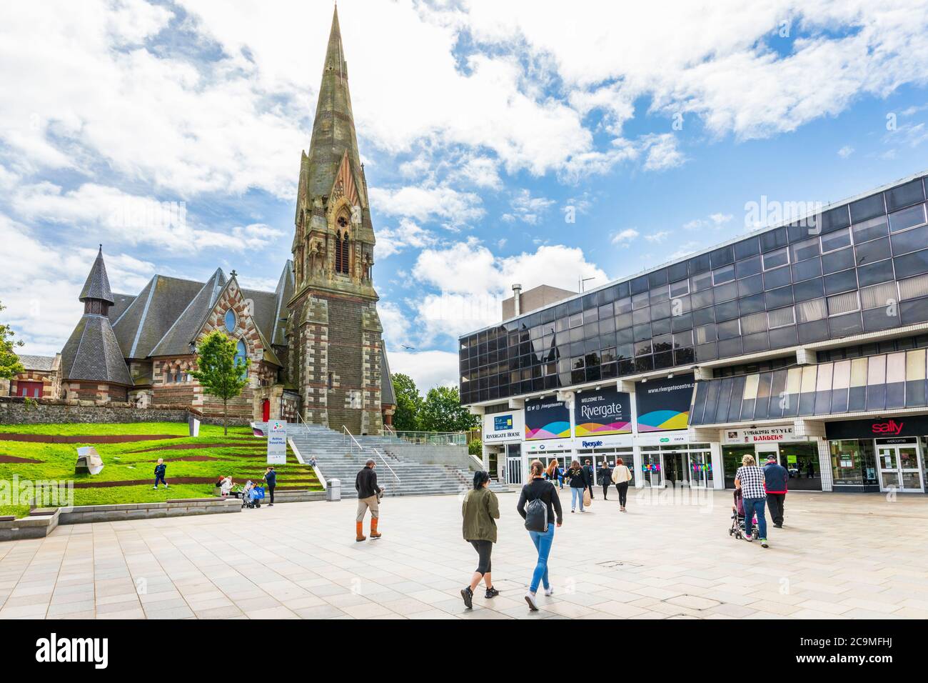 Entrance to the Rivergate shopping centre, Irvine, Ayrshire, Scotland, UK with the Trinity Church Stock Photo