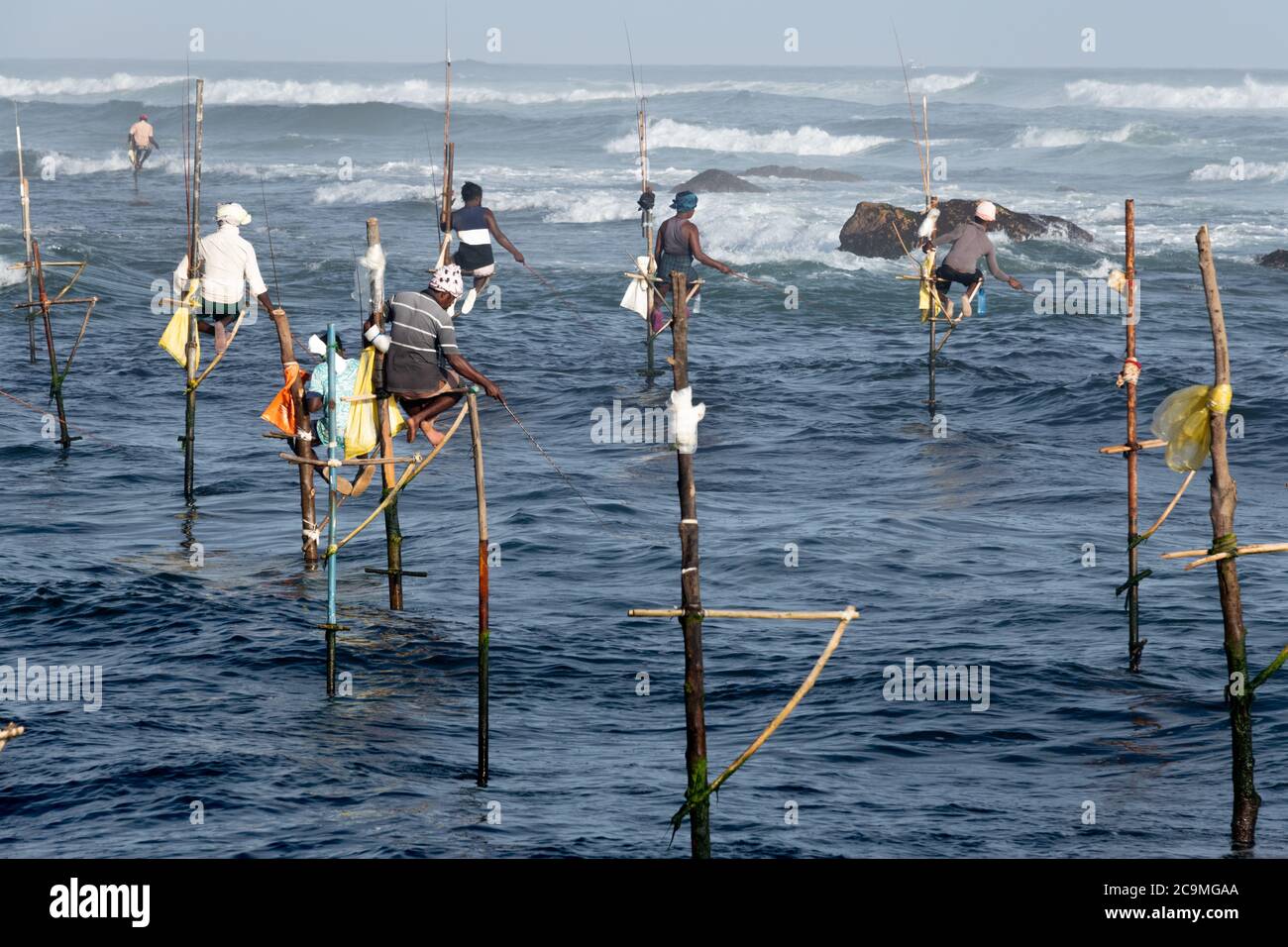 Traditional stilt fishermen near Koggala in southern Sri Lanka Stock ...