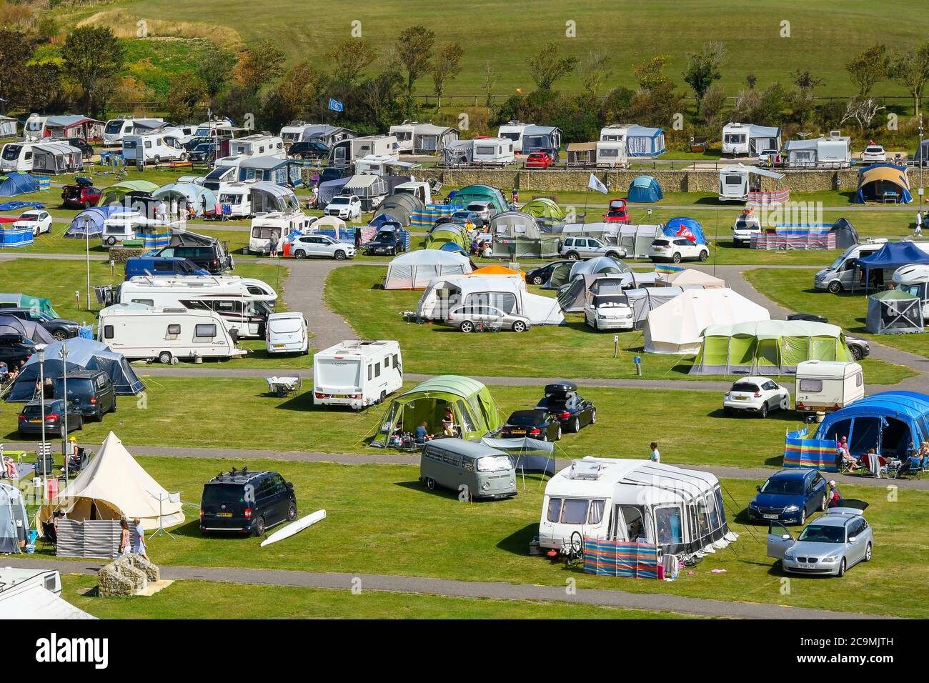 Burton Bradstock, Dorset, UK. 1st August 2020. UK Weather. The camp ...