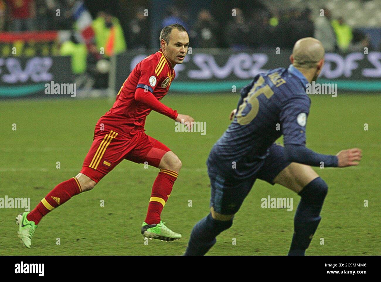 Christophe Jallet and Andres Iniesta during the Qualification Coupe du  Monde 2014 France - Espagne 2013,on March 26 2013 in Stade de France, France-  Photo Laurent Lairys / DPPI Stock Photo - Alamy