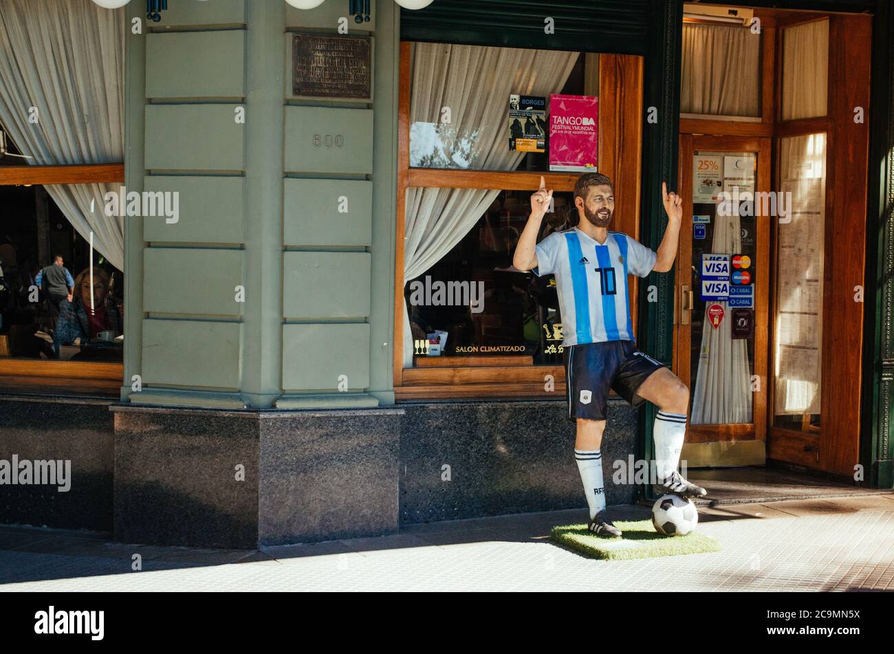 Recoleta, Buenos Aires, Argentina - September 4, 2018: A Lionel Messi statue, a famous argentinian football player, in front of a restaurant. Stock Photo