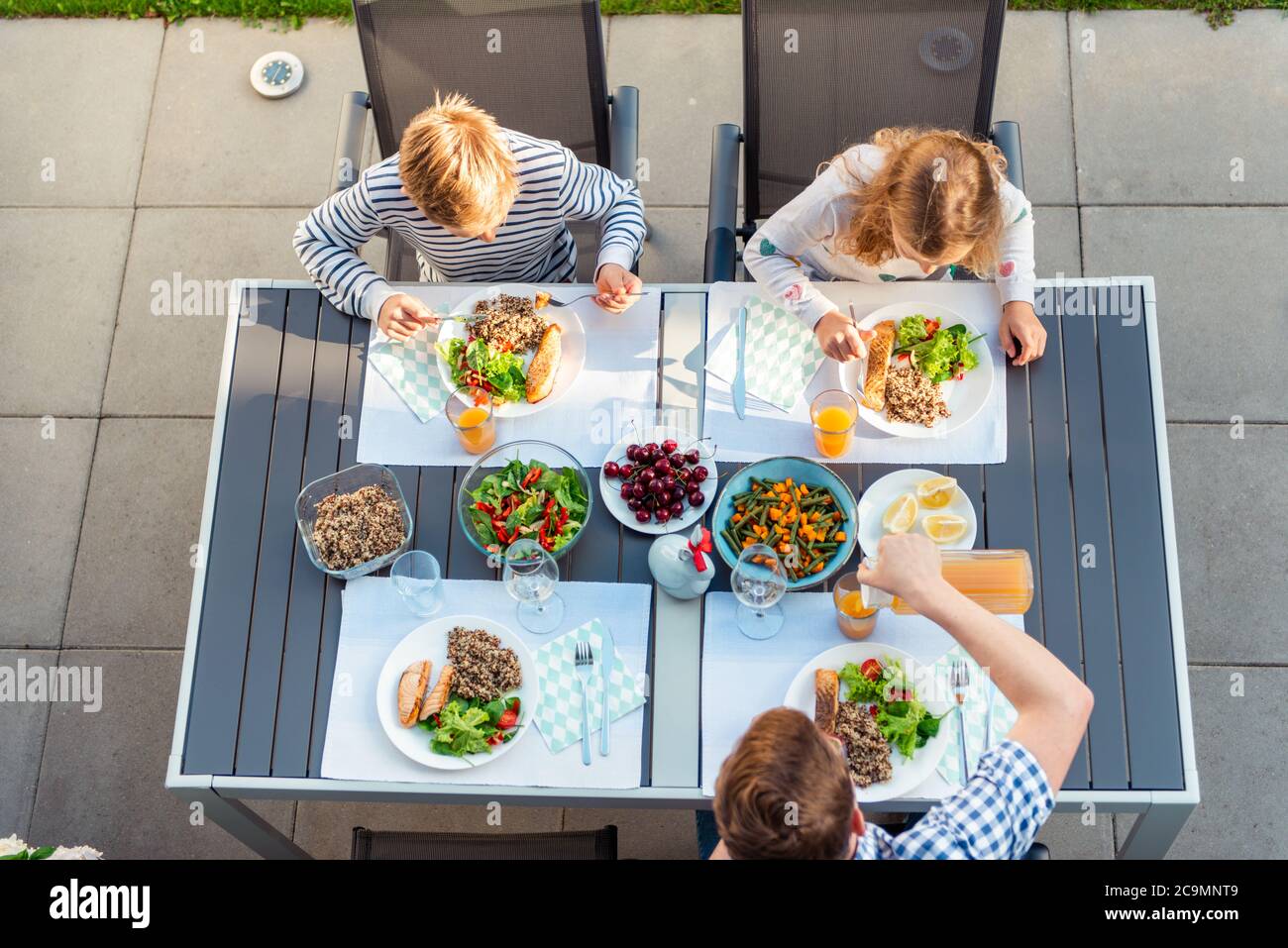 Family table eating from above children hi-res stock photography and ...