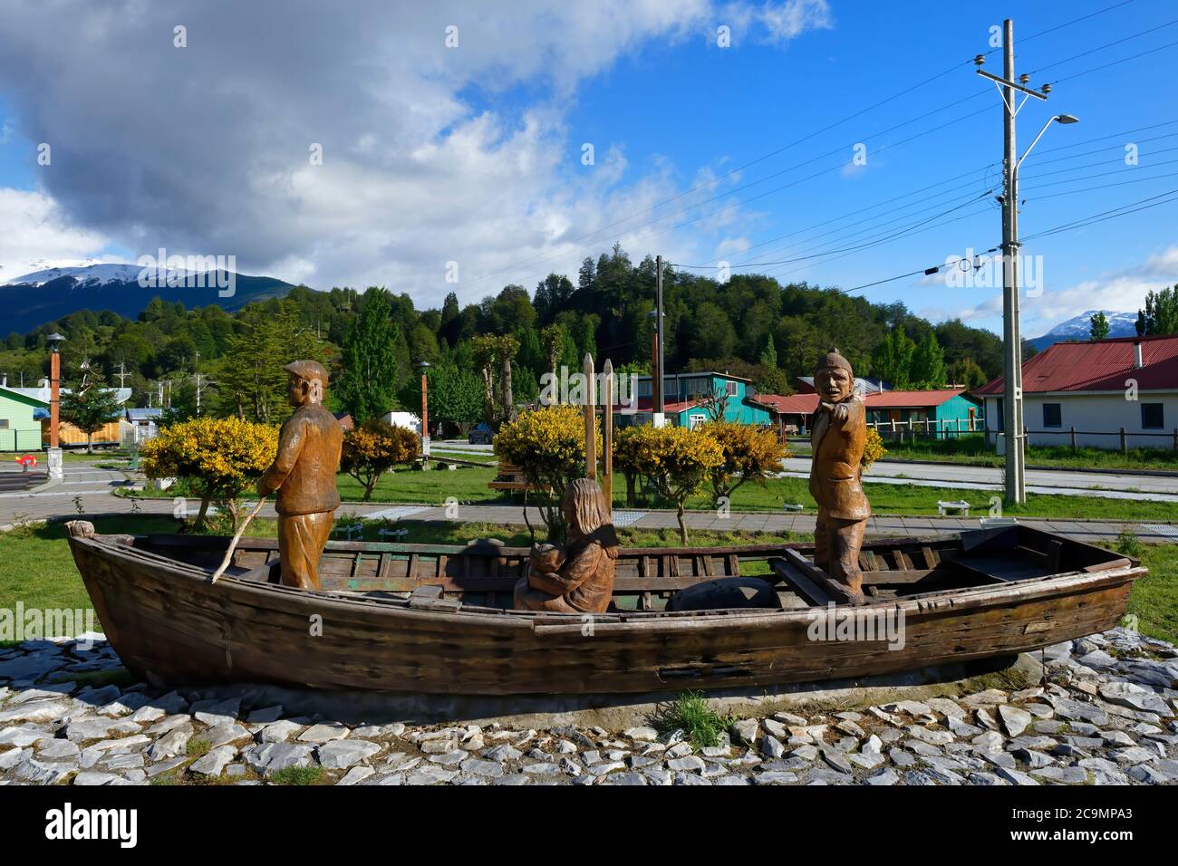 Puerto Río Tranquilo, Main Square, Wooden sculpture representing fishermen, Carretera Austral, Aysen Region, Patagonia Stock Photo