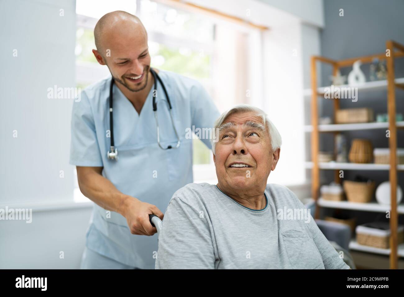 Senior Healthcare Caregiver And Happy Elder Patient Stock Photo - Alamy