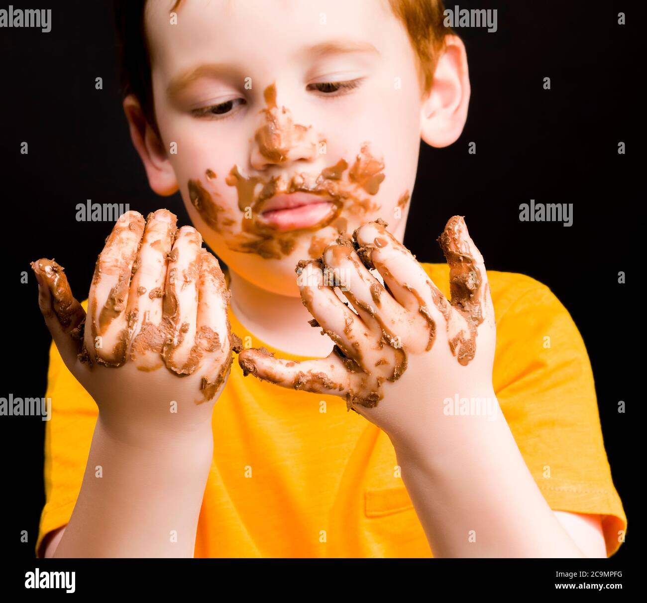 real milk chocolate and a baby that is completely smeared in melted