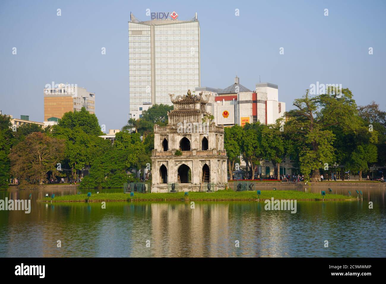 HANOI, VIETNAM - DECEMBER 13, 2015: View of the Turtle Temple on Hoan Kiem Lake on a sunny day Stock Photo