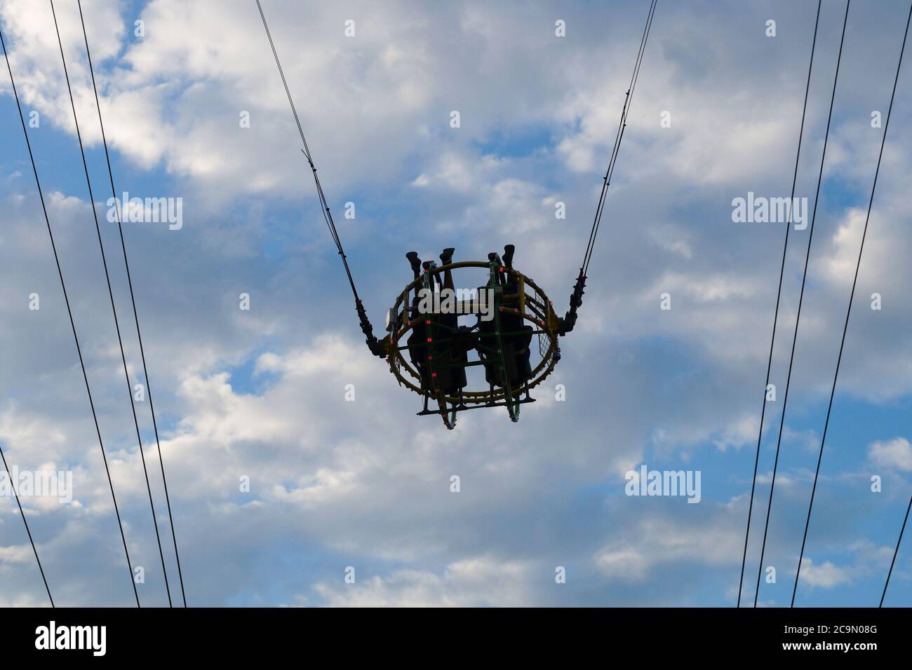 two people on the bungee ride bottom view. Stock Photo