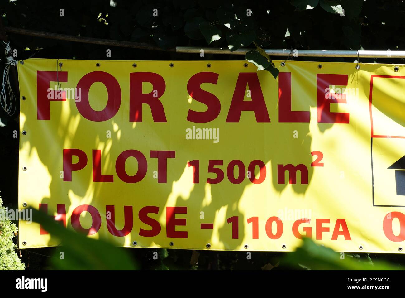 ad on the street for the sale of a plot with a house Stock Photo Alamy