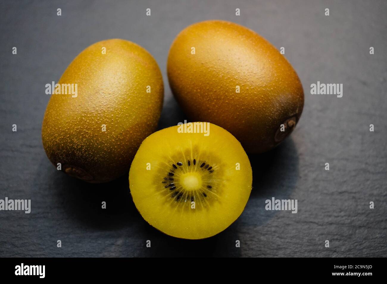 Fresh sliced golden Kiwi fruit Stock Photo Alamy