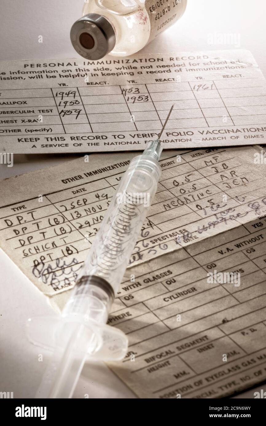 1950s immunization records and hypodermic needle, USA Stock Photo