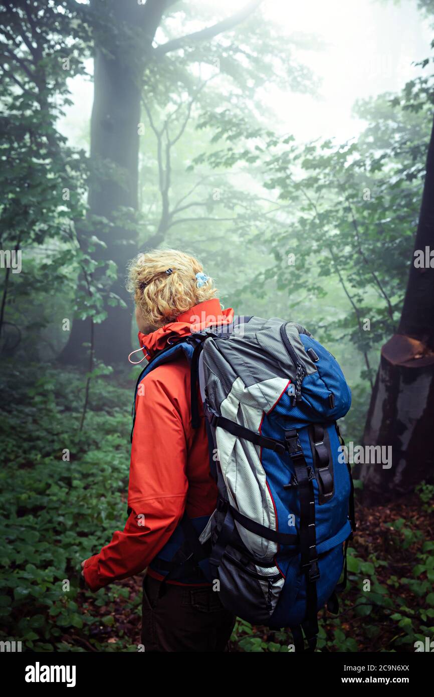 Female woman trekking forest hi-res stock photography and images - Alamy