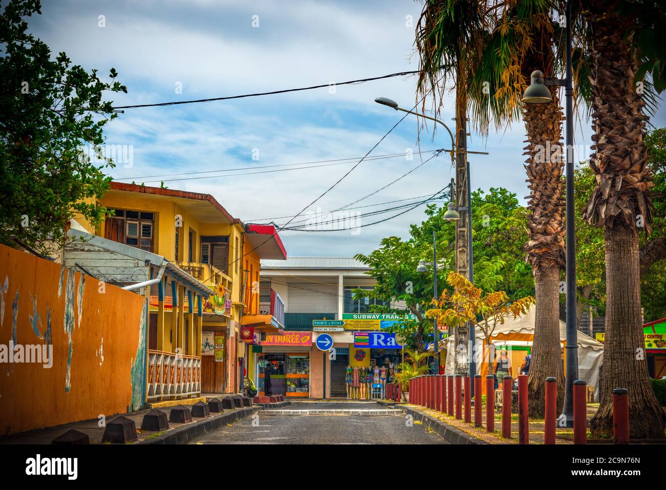 Guadeloupe, FR - February 15, 2019: Picturesque street in a small village in Guadeloupe, French west indies. Lesser Antilles, Caribbean Stock Photo