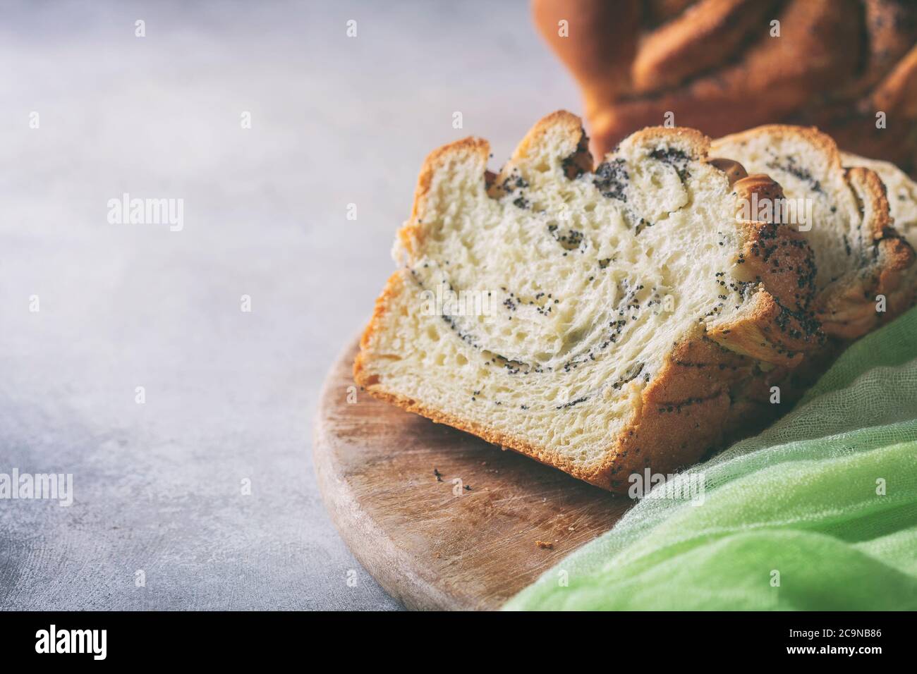 Homemade poppy seed braided bread, selective focus . Wreath. National