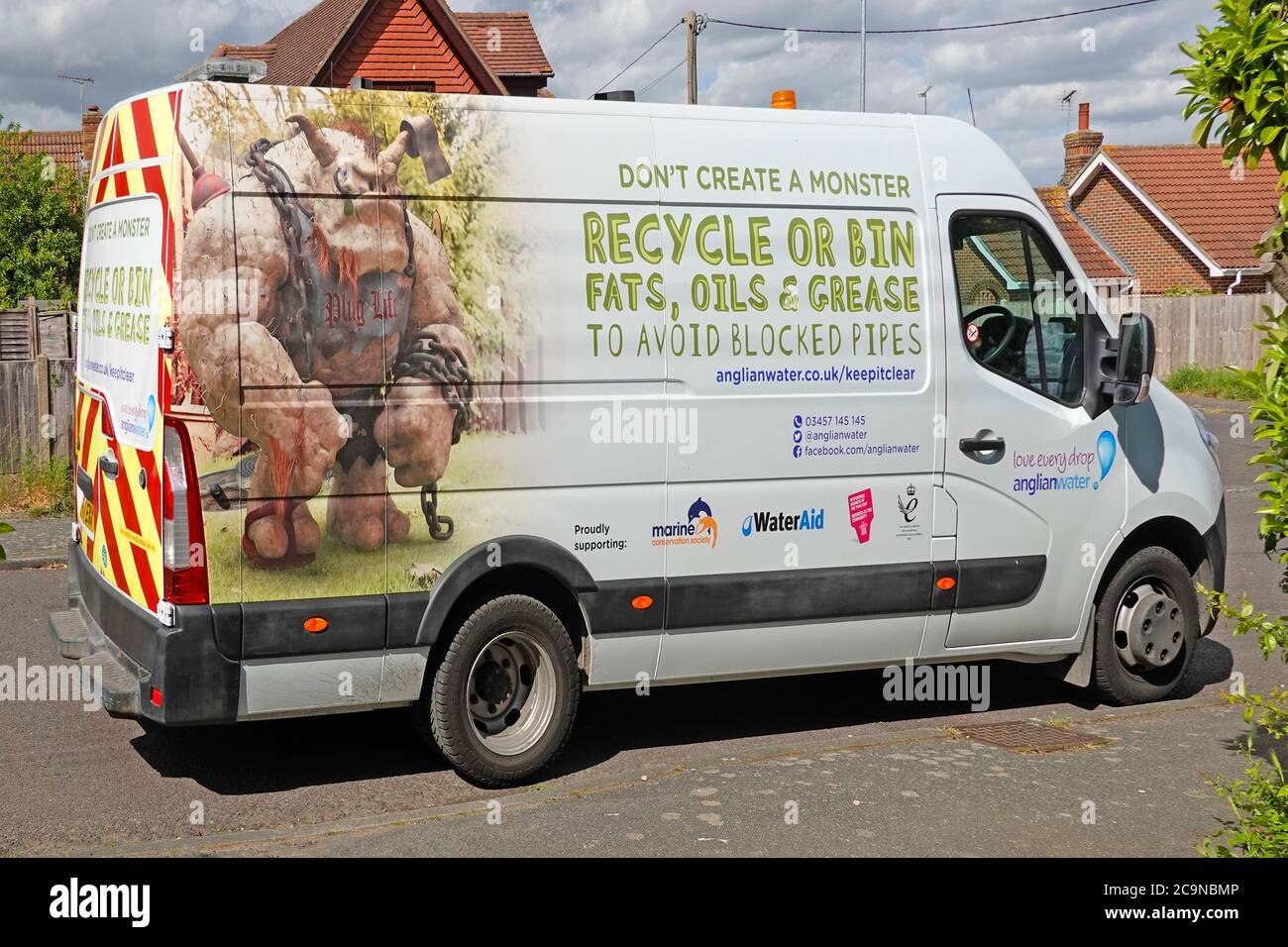 Anglian Water van providing blocked drain sewer clearing service & educational advertising promoting recycle fats oils grease preventing blockages UK Stock Photo