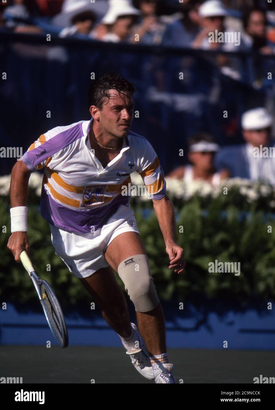 Mikael Pernfors running down a forehand during a match at the 1989 US Open  at Flushing Meadow Stock Photo - Alamy