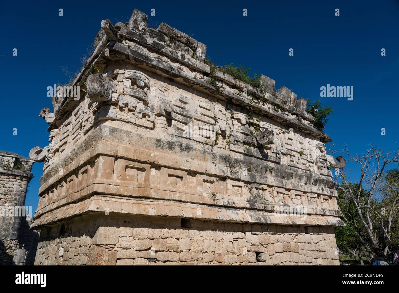 The Iglesia or the Church in the the Nunnery Complex in the ruins of the great  Mayan city of Chichen Itza, Yucatan, Mexico.  Built in the Puuc style. Stock Photo