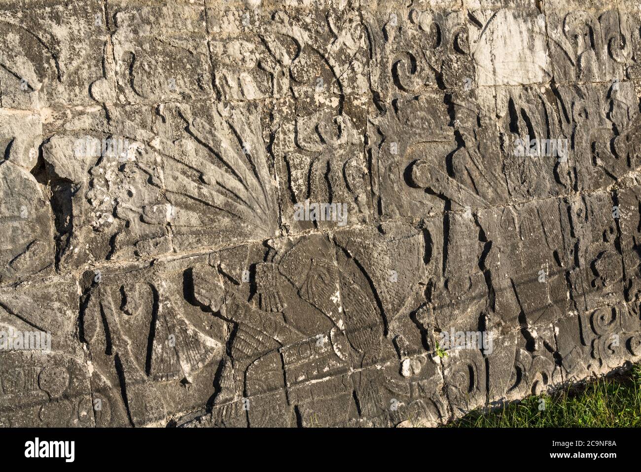 Stone bas relief carvings of ball players on the walls of the Great
