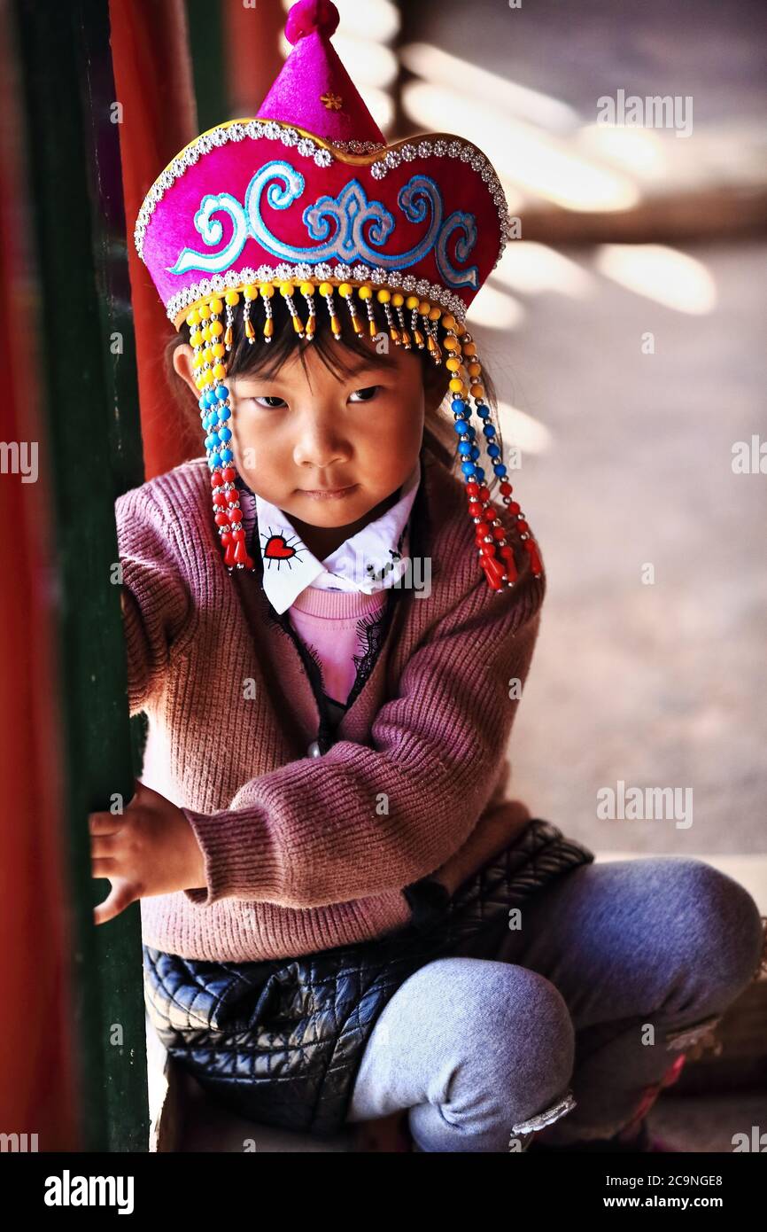 Little girl of the Yugur ethnic group. Horse Hoof Temple-Zhangye-Gansu-China-0998 Stock Photo
