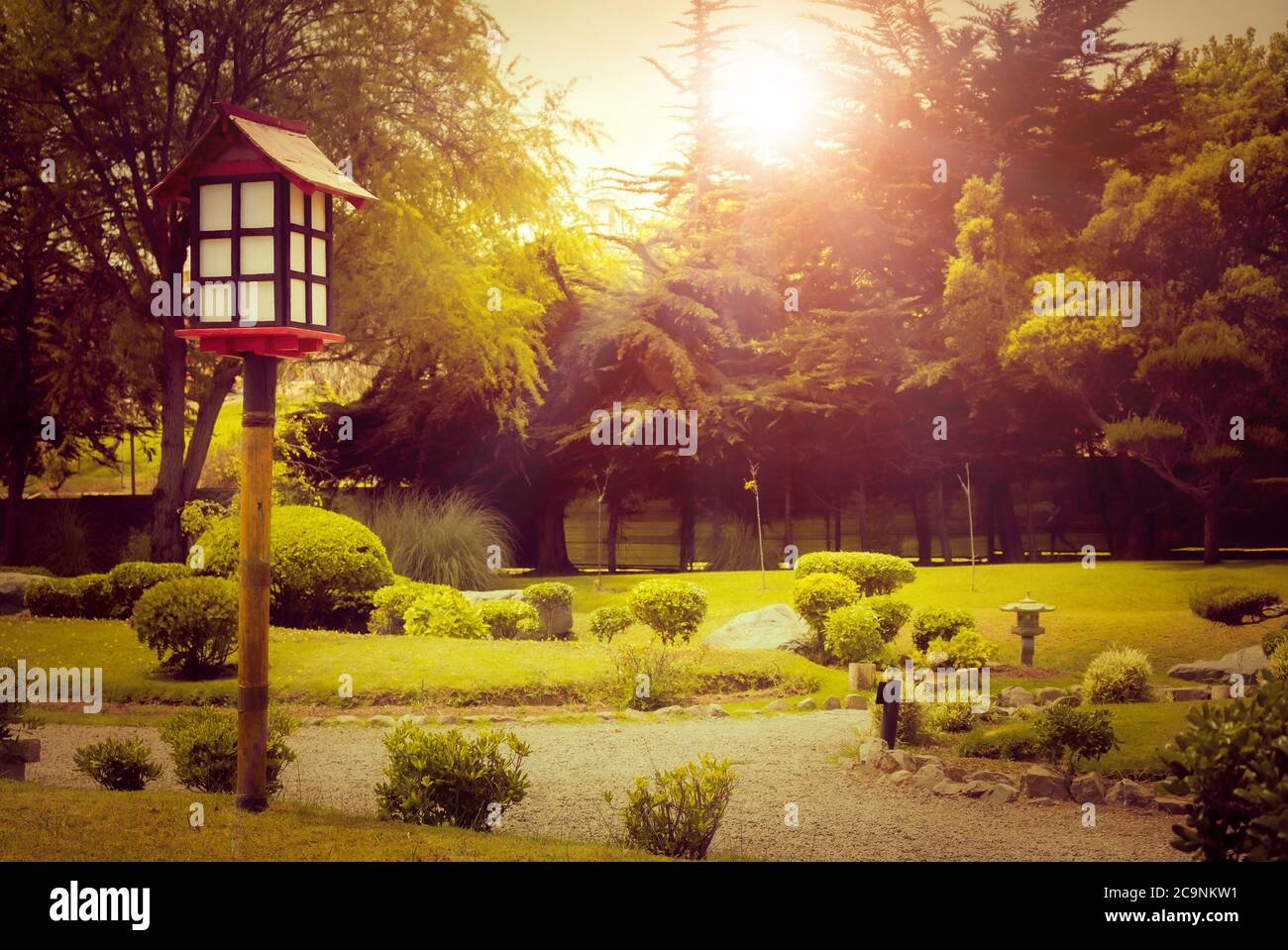 Closeup wtih decorative wooden lantern in japanese garden at sunset in La Serena, Chile Stock Photo