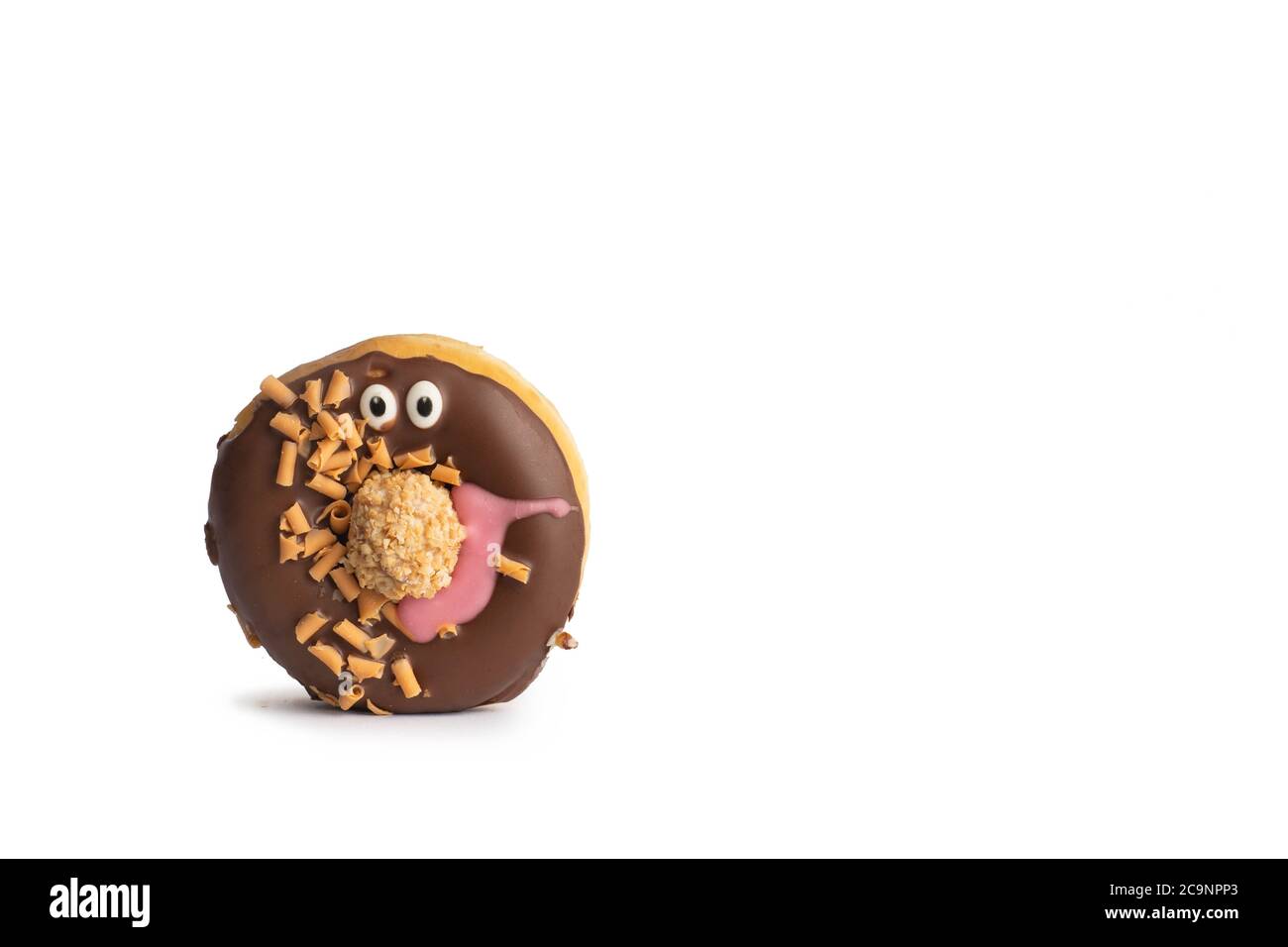 Blue donut with eyes and biscuit isolated on blue background with soft shadow Stock Photo Alamy