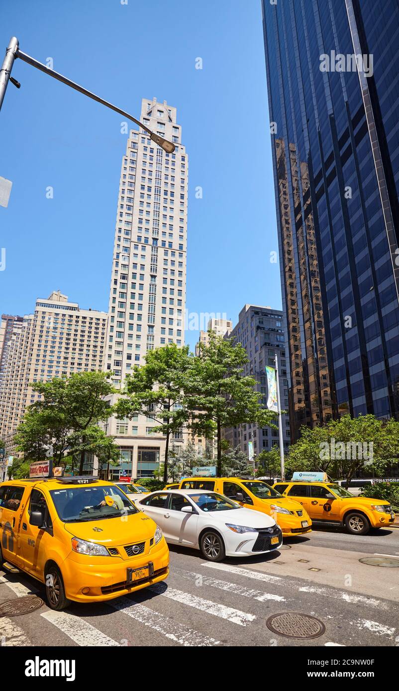 New York, USA - June 30, 2018: Yellow Taxi Cabs on Broadway Road on a sunny summer day. Stock Photo