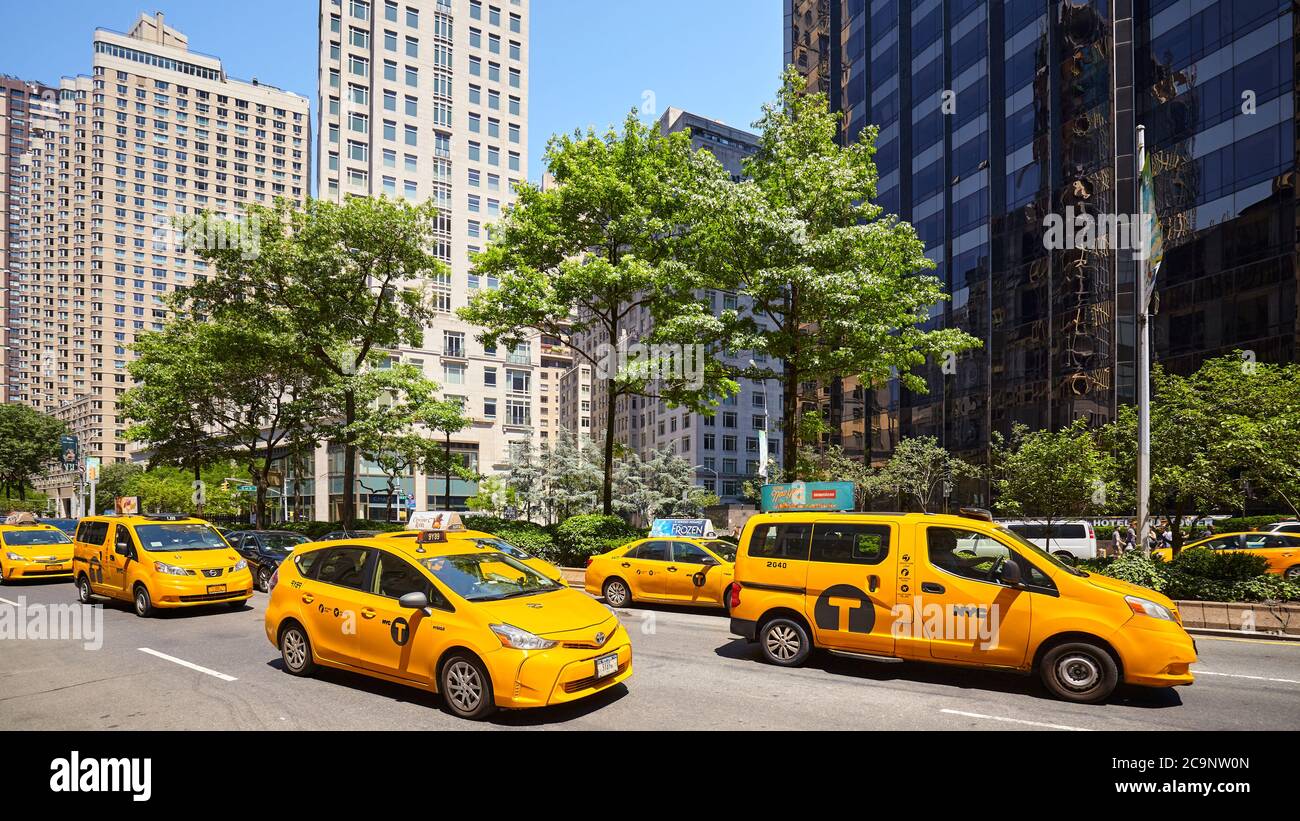 New York, USA - June 30, 2018: Yellow Taxi Cabs on Broadway Road on a sunny summer day. Stock Photo