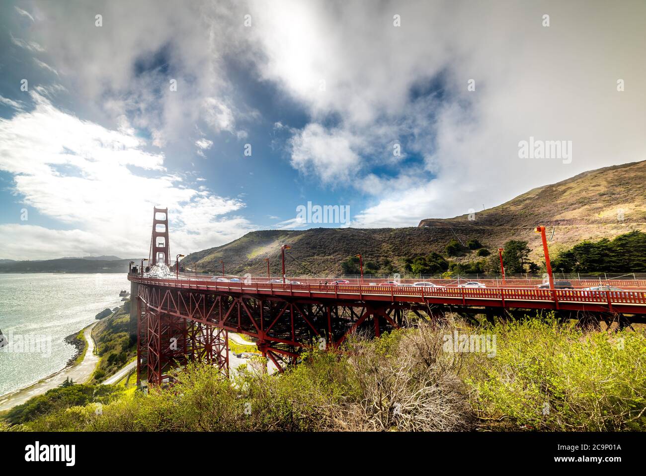 World famous Golden Gate bridge under a cloudy sky. San Francisco ...