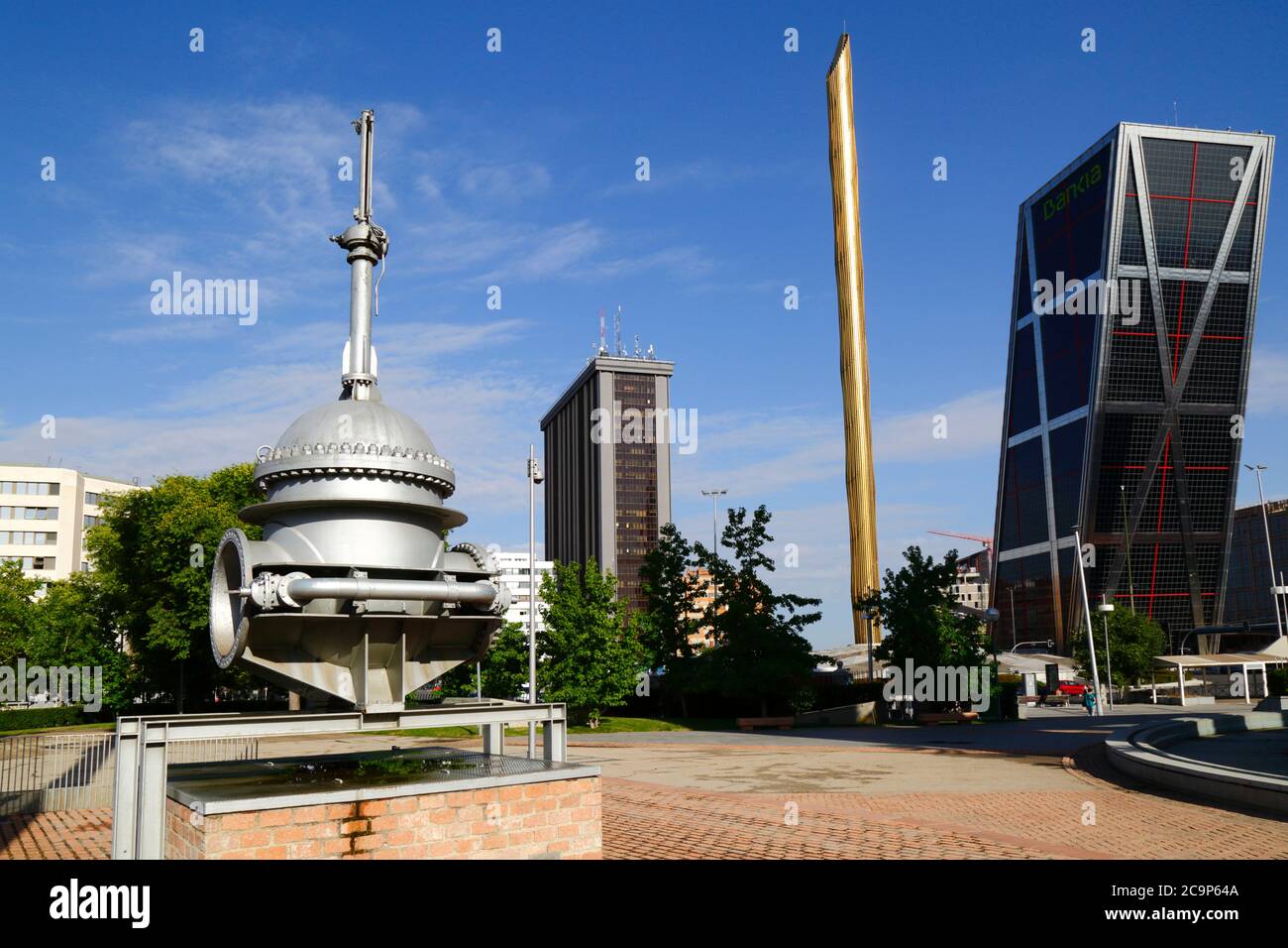 Machinery from former water works, one of Gate of Europe / KIO Towers on RHS, Parque Cuarto Deposito, Madrid, Spain Stock Photo