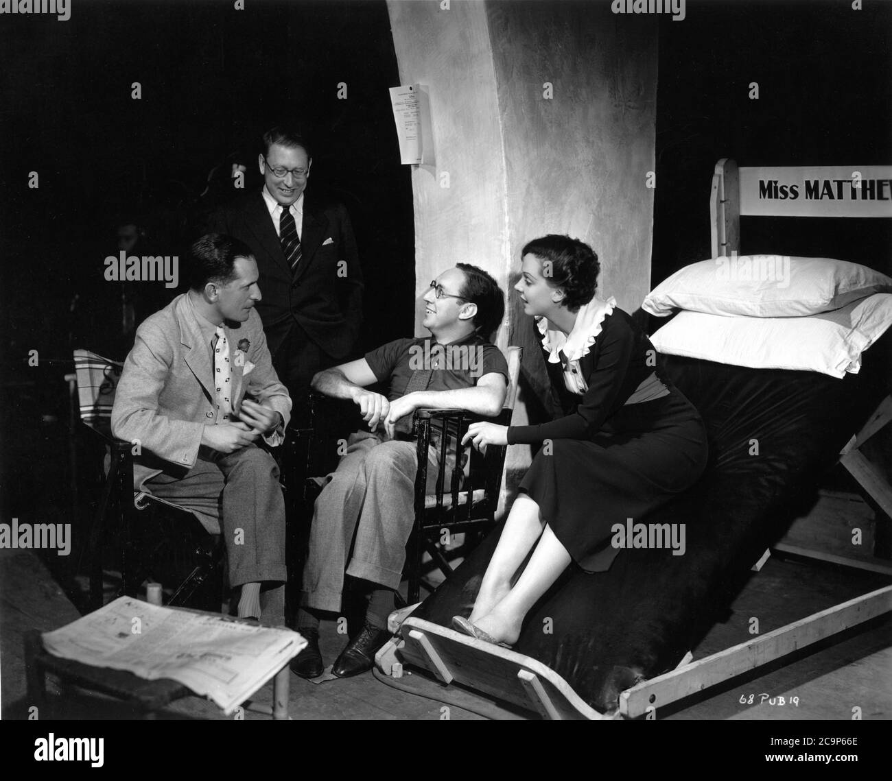 Associate Producer SHAN BALCON Musical Director LOUIS LEVY Director SONNIE HALE and JESSIE MATTHEWS on set candid during filming of HEAD OVER HEELS aka HEAD OVER HEELS IN LOVE 1937 Gaumont British Picture Corporation Stock Photo