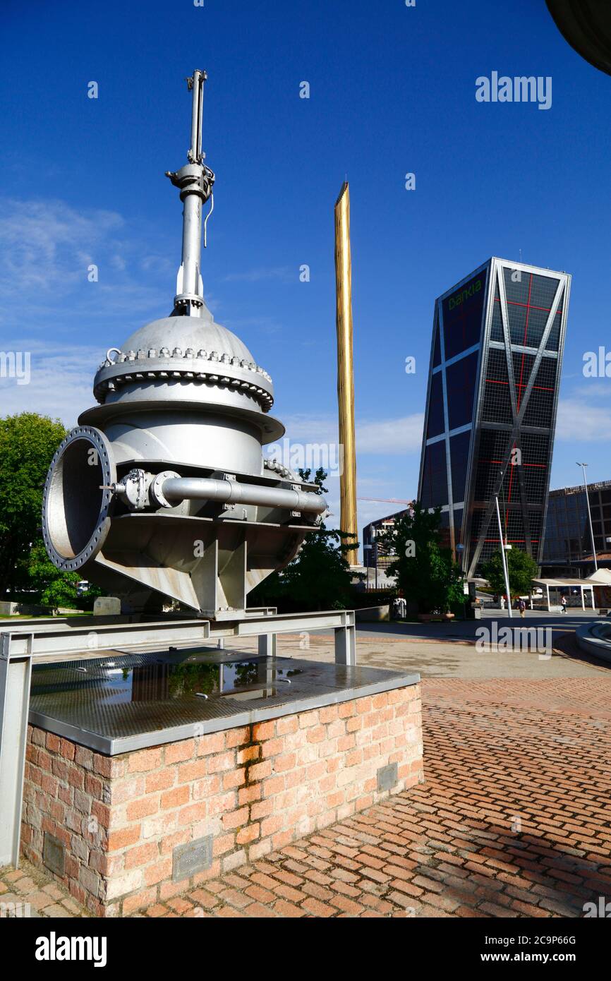 Machinery from former water works, one of Gate of Europe / KIO Towers on RHS, Parque Cuarto Deposito, Madrid, Spain Stock Photo