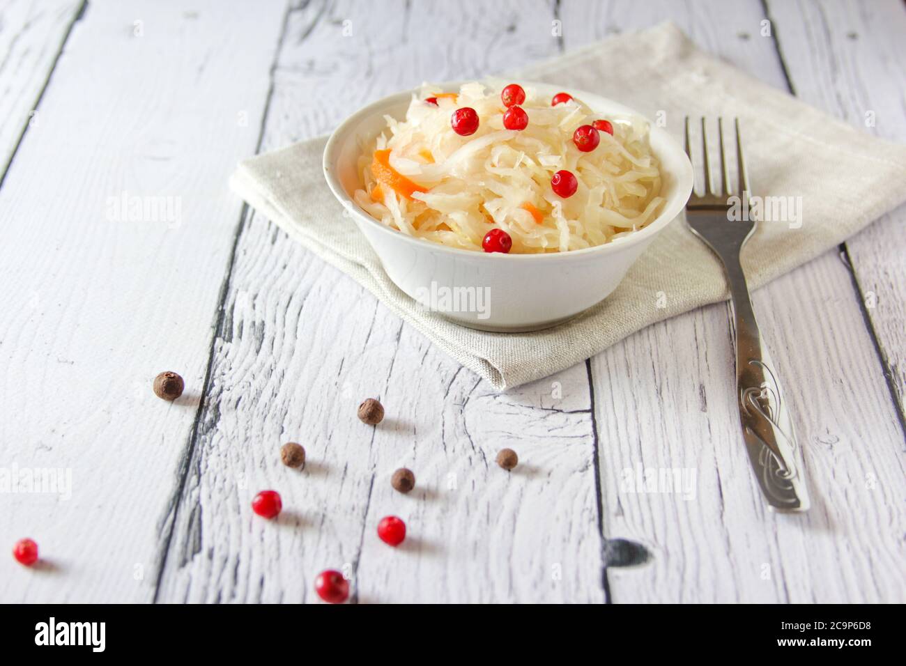 Sauerkraut is fermented cabbage with red cranberry with vitamins C and K, potassium, calcium