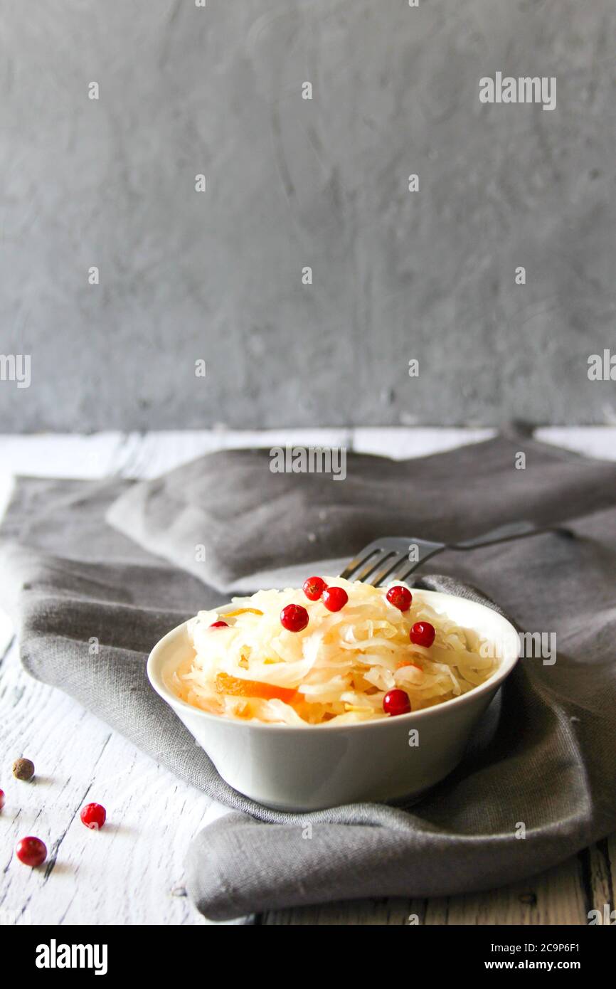 Sauerkraut is fermented cabbage with red cranberry with vitamins C and
