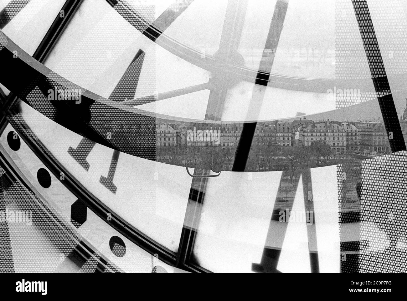 View across the Seine through the Musée d'Orsay clock. Stock Photo